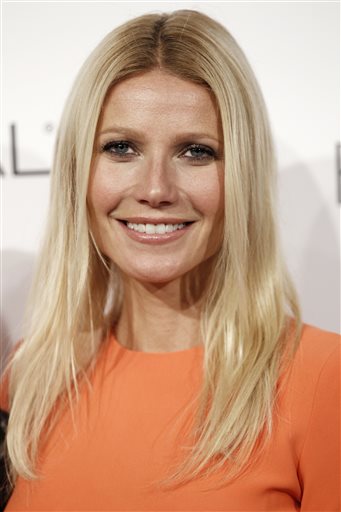In this Oct. 18, 2010, file photo, actress Gwyneth Paltrow arrives at a ELLE magazine's 17th Annual Women in Hollywood Tribute in Beverly Hills, Calif. Paltrow and Joel Gallen are returning to produce Stand Up to Cancer for a second time and other stars from TV, film and music will encourage and accept donations from the public. The money raised supports cross-disciplinary research toward new cancer treatments. (AP Photo/Matt Sayles, File)