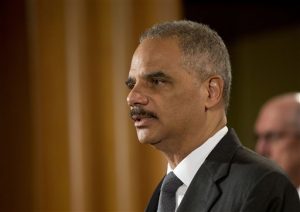 Attorney General Eric Holder announces at the Justice Department in Washington Monday, July 14, 2014, that Citigroup will pay $7 billion to settle an investigation into risky subprime mortgages, the type that helped fuel the financial crisis. The agreement comes weeks after talks between the sides broke down, prompting the government to warn that it would sue the New York investment bank. The bank had offered to pay less then $4 billion, a sum substantially less that what the Justice Department was asking for. The settlement stems from the sale of securities made up of subprime mortgages, which fueled both the housing boon and bust that triggered the Great Recession at the end of 2007. (AP Photo/Pablo Martinez Monsivais)