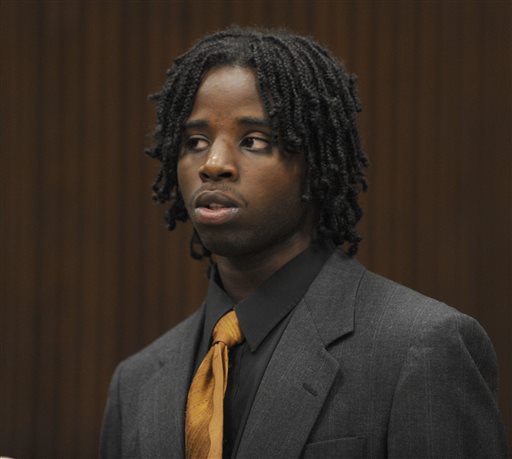 Latrez Cummings stands before Judge James Callahan to hear sentencing, for his role in the mob beating of Steve Utash, at the Frank Murphy Hall of Justice in Detroit, Mich., on Thursday, July 17, 2014. (AP Photo/Detroit News,Charles V. Tines) 