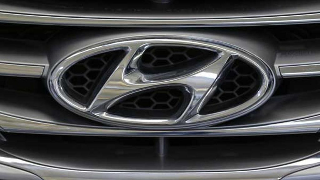 This Photo taken Feb. 14, 2013 shows the Hyundai logo on the grill of a Hyundai automobile at the 2013 Pittsburgh Auto Show in Pittsburgh. (AP Photo/Gene J. Puskar)