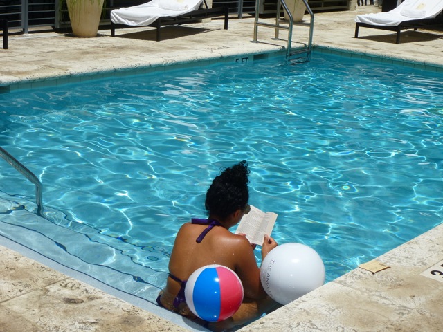 Guest reading in the pool at the The Angler's Hotel on Miami's South Beach  (Photo by Dwight Brown)