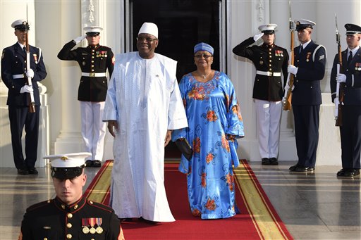 Ibrahim Boubacar Keita, President of the Republic of Mali and his wife Keita Aminata Maiga arrive for a dinner hosted by President Barack Obama for the U.S. Africa Leaders Summit, Tuesday, Aug. 5, 2014. African heads of state are gathering in Washington for an unprecedented summit to promote business development. (AP Photo/Susan Walsh)