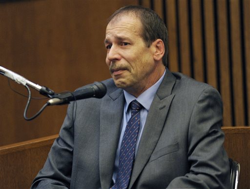 Theodore Wafer testifies in his own defense during the seventh day of testimony for the Nov. 2, 2013, killing of Renisha McBride, Monday, Aug. 4, 2014, in Detroit. He said he feared for his life when he fired at McBride on his porch in Dearborn Heights, Mich. Wafer is charged with second-degree murder and could be sentenced to up to life in prison with the chance for parole, if he's convicted. (AP Photo/Detroit News, Clarence Tabb Jr.)