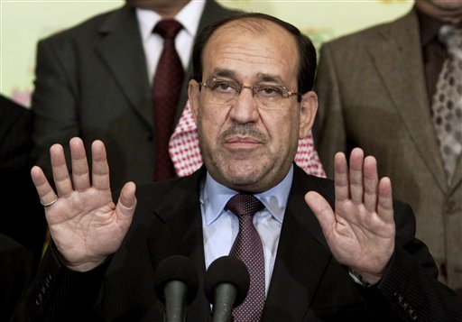 In this Friday, March 26, 2010 file photo, Iraqi Prime Minister Nouri al-Maliki speaks to the press in Baghdad, Iraq. Iraq's Nouri al-Maliki has given up his post as prime minister to Haider al-Abadi, state television reported Thursday, Aug. 14, 2014  a move that could end a political deadlock that plunged Baghdad into uncertainty as the country fights a Sunni militant insurgency. (AP Photo/Hadi Mizban, File)