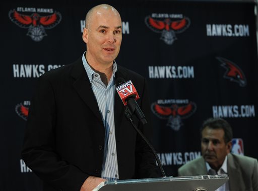 FILE - In this June 25, 2012, file photo, Atlanta Hawks president of operations and general manager Danny Ferry speaks during a news conference in Atlanta, as team co-owner Bruce Levenson, right, looks on. Ferry has been disciplined by CEO Steve Koonin for making racially charged comments about Luol Deng when the team pursued the free agent this year. Ferry apologized Tuesday, Sept. 9, 2014,  for repeating comments that were gathered from numerous sources about Deng.  (AP Photo/The Atlanta Journal-Constitution, Johnny Crawford)