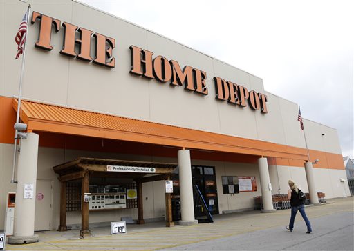FILE - In this Aug. 14, 2012 file photo, a customer walks toward a Home Depot in Nashville, Tenn. Home Depot on Monday, Sept. 8, 2014 confirmed that its payment systems have been hacked in a data breach that could affect millions of shoppers who used credit and debit cards at its more than 2,000 U.S. and Canadian stores. (AP Photo/Mark Humphrey, File)