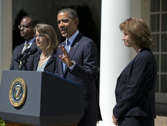 President Obama with some of his nominees to the U.S. Court of Appeals for the D.C. Circuit in June. (Evan Vucci, AP)