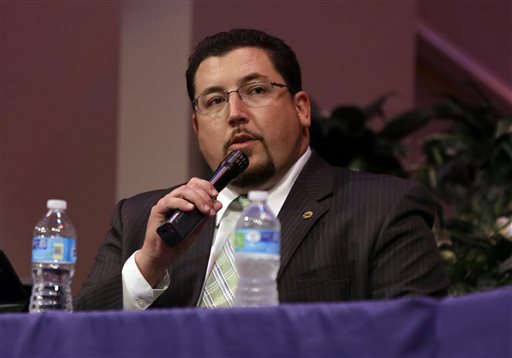 Ferguson Mayor James Knowles speaks during a meeting of the Ferguson City Council Tuesday, Sept. 9, 2014, in Ferguson, Mo. The meeting is the first for the city council since the fatal shooting of Michael Brown by a city police officer. (AP Photo/Jeff Roberson)