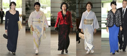 This combination of photos shows five women newly appointed for Japanese Prime Minister Shinzo Abe's Cabinet leaving the prime minister's official residence for the attestation ceremony at the Imperial Palace in Tokyo Wednesday, Sept. 3, 2014. Abe picked the five women for his Cabinet Wednesday, matching the past record and sending the strongest message yet about his determination to revive the economy by getting women on board as workers and leaders. They are from left: Internal Affairs Minister Sanae Takaichi, Minister in charge of Promoting Women Haruko Arimura, Justice Minister Midori Matsushima, Minister in charge of Japanese Abducted by North Korea Eriko Yamatani and Trade Minister Yuko Obuchi. (AP Photo/Eugene Hoshiko)