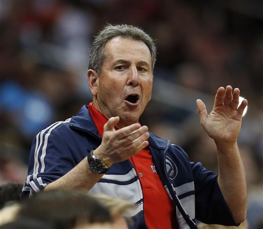 In this April 26, 2014, file photo, Atlanta Hawks co-owner Bruce Levenson cheers from the stands in the second half of Game 4 of an NBA basketball first-round playoff series against the Indiana Pacers in Atlanta. Levenson said Sunday, Sept. 7, 2014, he is selling his controlling interest in the team, in part due to an inflammatory email he said he wrote in an attempt "to bridge Atlanta's racial sports divide." (AP Photo/John Bazemore, File)