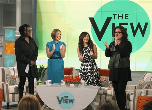 In this image released by ABC, co-hosts, from left, Whoopi Goldberg, Nicolle Wallace, Rosie Perez and Rosie O'Donnell appear on the set of the daytime talk show "The View," on Monday, Sept. 15, 2014 in New York. (AP Photo/ABC, Lou Rocco)