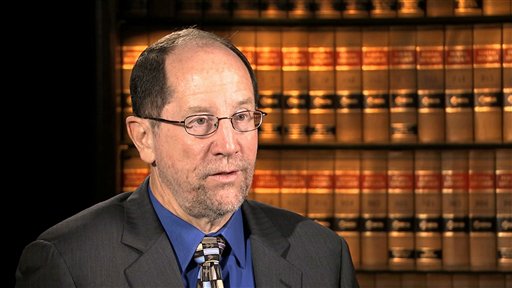 This image from video shows Dr. Dan Lucey of the Georgetown University Medical Center, during an interview with The Associated Press in Washington, Thursday, Sept. 4, 2014, where he discussed the three weeks he spent in Sierra Leone working in a hospital in Freetown and helping other doctors to train local health workers to use personal protective equipment. (AP Photo)