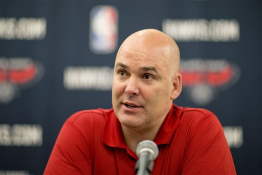 In this July 10, 2013, file photo, Atlanta Hawks general manager Danny Ferry speaks at a press conference in Atlanta. Ferry has been disciplined by CEO Steve Koonin for making racially charged comments about Luol Deng when the team pursued the free agent this year. Ferry apologized Tuesday, Sept. 9, 2014,  for repeating comments that were gathered from numerous sources about Deng. (AP Photo/David Goldman, File)