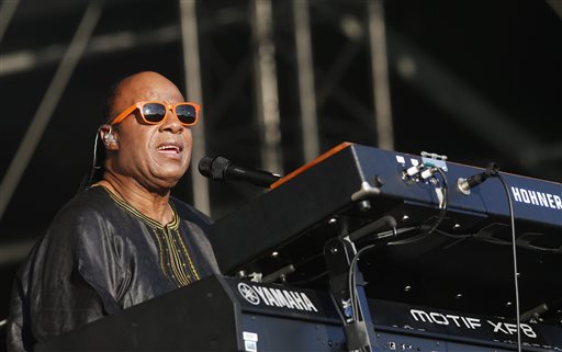 In this June 29, 2014 file photo, US singer Stevie Wonder performs at the Calling festival, in London. Wonder said the mayor of Ferguson, Mo., isnt seeing the full picture a month after an unarmed black teenager was killed by a white police officer. I dont know if the mayor has blinders on, Wonder said in an interview Wednesday, Sept. 10, 2014. But to say that he didnt know that there was a racial or cultural problem in the city is unfortunate. (Photo by Jim Ross/Invision/AP)