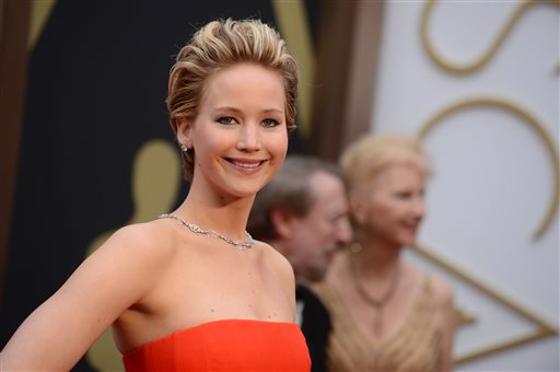 In this March 2, 2014 file photo, Jennifer Lawrence arrives at the Oscarsat the Dolby Theatre in Los Angeles.   As the celebrity photo-hacking scandal has made clear, privacy isn't what it used to be. Whether famous or seemingly anonymous, people from all walks of life put all sorts of things online or into cloud-based storage systems, from vital financial information to the occasional nude photo. Periodic cases of hacking fuel outrage, but there's no retreat from digital engagement or any imminent promise of guaranteed privacy. (Photo by Jordan Strauss/Invision/AP)