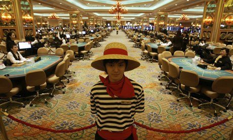Gambling tables inside the casino at the Venetian Macao Resort Hotel. (Kin Cheung/AP)