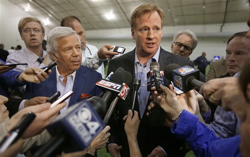 In this Thursday, May 29, 2014, file photo, NFL Commissioner Roger Goodell, right, addresses members of the media in Foxborough, Mass. The NFL is under pressure from sponsors, fans and lawmakers for its handling of domestic violence allegations against several players. At issue is whether the league is acting swiftly enough to investigate or discipline players. (AP Photo/Stephan Savoia, File)