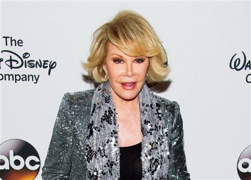 In this May 14, 2014 file photo, TV personality Joan Rivers attends A Celebration of Barbara Walters in New York. Melissa Rivers announced Thursday, Sept. 4, that her mother Joan died Thursday, in New York. Rivers was hospitalized Aug. 28, after going into cardiac arrest at a doctor's office. (Photo by Charles Sykes/Invision/AP, File)