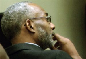 In this image taken from video, Rev. Juan McFarland listens to testimony during in a court hearing about the future of Shiloh Missionary Baptist Church in Montgomery, Ala., on Thursday, Oct. 16, 2014. McFarland, who members say admitted to adultery and drug use from the pulpit, is fighting an attempt to remove him from the pastorate. (AP Photo/Jay Reeves)