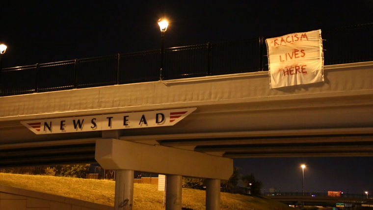 A banner in Ferguson, MO (Rebecca Rivas/St. Louis American)