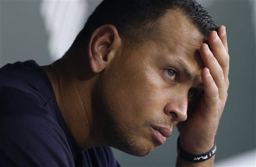 In this Sept. 11, 2013, file photo, New York Yankees' Alex Rodriguez wipes sweat from his brow as he sits in the dugout before a baseball game against the Baltimore Orioles in Baltimore. The U.S. government says New York Yankees star Alex Rodriguez paid his cousin almost $1 million to keep secret Rodriguez's use of performance enhancing drugs. In court documents filed last week in Miami, federal prosecutors say Rodriguez paid $900,000 last year to settle a threatened lawsuit by Yuri Sucart, who had worked as Rodriguez's personal assistant. Sucart, in a letter from his lawyer, threatened to expose Rodriquez's PED use if he wasn't paid $5 million. (AP Photo/Patrick Semansky, File)