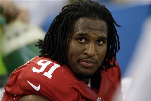 In this Sept. 7, 2014, file photo, San Francisco 49ers' Ray McDonald sits on the bench during the second half of an NFL football game against the Dallas Cowboys in Arlington, Texas. Northern California authorities are investigating 49ers defensive lineman Ray McDonald on suspicion of sexual assault. San Jose Police Department Sgt. Heather Randol said Wednesday, Dec. 17, 2014, that detectives searched McDonald's San Jose home. (AP Photo/LM Otero, File)
