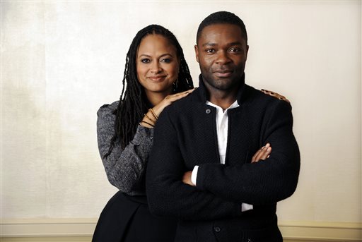 FILE - In this Wednesday, Nov. 12, 2014 file photo, Ava DuVernay, left, director of the film "Selma," and cast member, David Oyelowo, who plays Martin Luther King Jr., pose together at the Four Seasons Hotel in Los Angeles.  The widely acclaimed movie "Selma" about the 1965 Civil Rights movement has disappointed at least one moviegoer: a leading historian of President Lyndon B. Johnson. The director of the LBJ Presidential Library in Austin, which hosted a major civil rights summit this year that was headlined by four U.S. presidents, said the film that opens in theaters Thursday, Dec. 25, 2014, incorrectly portrays Johnson as an obstructionist to the Rev. Dr. Martin Luther King Jr. (Photo by Chris Pizzello/Invision/AP)