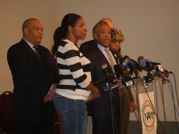 The Rev. Al Sharpton and the family of Eric Garner at the National Action Network. (Herb Boyd/New York Amsterdam News)