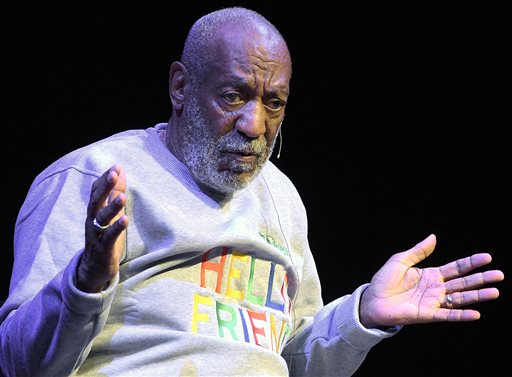 In this Nov. 21, 2014 file photo, comedian Bill Cosby performs during a show at the Maxwell C. King Center for the Performing Arts in Melbourne, Fla. Los Angeles prosecutors have declined to file any charges against Cosby after a woman recently reported the comedian molested her around 1974. The rejection of a child sexual abuse charge by prosecutors on Tuesday comes roughly 10 days after the woman, Judy Huth, met with police detectives. The Los Angeles County District Attorneys Office rejected filing a misdemeanor charge of annoying or molesting a child under the age of 18 because the statute of limitations had passed. (AP Photo/Phelan M. Ebenhack, File)