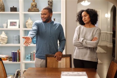 In this image released by ABS, Anthony Anderson, left, and Tracee Ellis Ross appear in a scene from "Black-ish." The series was created by Kenya Barris, who was motivated to write the comedy about an African-American familys efforts to honor its heritage in part by the unreality of what he grew up watching on television. (AP Photo/ABC, Kelsey McNeal)