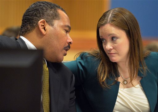 Dexter Scott King talks with attorney Nicole Wade during a hearing over who owns the Rev. Martin Luther King Jr.'s 1964 Nobel Peace Prize medal and traveling Bible on Tuesday, Jan. 13, 2015 in Fulton County Superior Court in Atlanta.  King's estate, which is controlled by his sons, last year asked a judge to order King's daughter to surrender the items. In a board of directors meeting, Martin Luther King III and Dexter Scott King voted 2-1 against Bernice King to sell the two artifacts to a private buyer.  (AP Photo/Atlanta Journal-Constitution, Kent D. Johnson)  MARIETTA DAILY OUT; GWINNETT DAILY POST OUT; LOCAL TELEVISION OUT; WXIA-TV OUT; WGCL-TV OUT