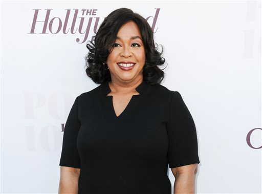 In this Dec. 10, 2014, file photo, Shonda Rhimes arrives at the The Hollywood Reporter's Women In Entertainment Breakfast in Los Angeles. Rhimes is arguably the most powerful producer in television these days. ABC has turned over to her its entire Thursday night lineup, where she delivers weekly episodes of Grey's Anatomy, Scandal and How to Get Away With Murder. (Photo by Richard Shotwell/Invision/AP, File)