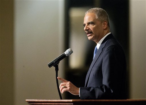 In this Dec. 1, 2014 file photo, Attorney General Eric Holder speaks at Ebenezer Baptist Church in Atlanta.  The Justice Department on Wednesday announced revised guidelines for obtaining records from the news media during leak investigations, removing language that news organizations said was ambiguous and requiring additional consultation before a journalist can be subpoenaed. (AP Photo/David Goldman, File)