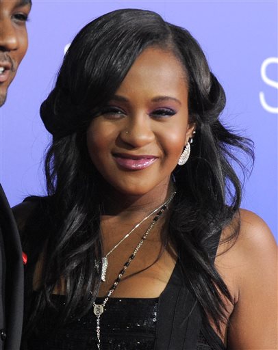 In this Aug. 16, 2012, file photo, Bobbi Kristina Brown attends the Los Angeles premiere of "Sparkle" at Grauman's Chinese Theatre in Los Angeles. Messages of support were being offered Monday, Feb. 2, 2015, as people awaited word on Brown, who authorities say was found face down and unresponsive in a bathtub over the weekend in a suburban Atlanta home. (Photo by Jordan Strauss/Invision/AP, File)