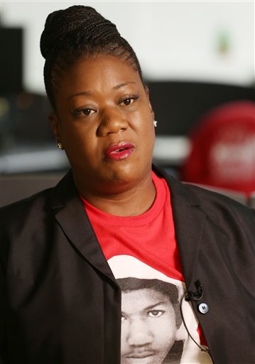 Sybrina Fulton, mother of Trayvon Martin, speaks with the Associated Press in Miami, Wednesday, Feb. 25, 2015. The U.S. Justice Department said Tuesday, Feb. 24, 2015, that George Zimmerman, the former neighborhood watch volunteer will not face federal charges in the shooting death of unarmed 17-year-old Martin. Zimmerman was acquitted in 2013 of second-degree murder. (AP Photo/Marta Lavandier)