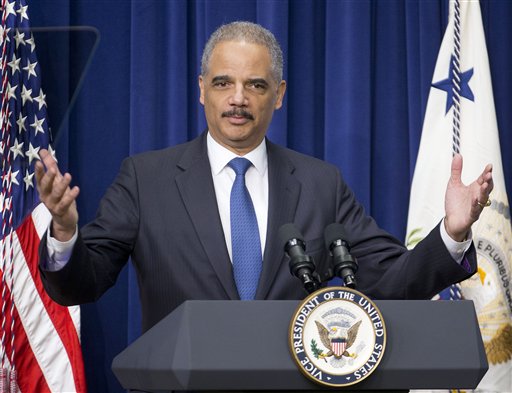 In this Feb. 11, 2015 file photo, Attorney General Eric Holder speaks to law enforcement officers and guests in the Old Executive Office Building on the White House Complex in Washington. The share of federal drug offenders who received harsh mandatory minimum sentences has plunged in the past year, according to figures obtained by The Associated Press that Holder plans to cite Tuesday in arguing for the success of his criminal justice policies. Experts credit Holder for helping raise sentencing policy as a public issue, but they also say it's hard to gauge how much of the impact is directly attributable to his actions. (AP Photo/Pablo Martinez Monsivais, File)