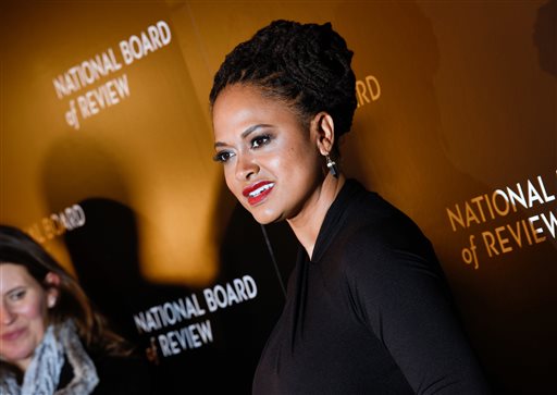 In this Jan. 6, 2015 file photo, Ava DuVernay, director of "Selma," attends the National Board of Review awards gala in New York.  DuVernay and Oprah Winfrey are creating a drama series for Winfrey's TV channel. The project is inspired by the Natalie Baszile novel "Queen Sugar," the OWN channel said Monday, Feb. 2. Winfrey will serve as executive producer and will play a recurring role _ the first time she's acted in a series for OWN, the network said. (Photo by Evan Agostini/Invision/AP, File)