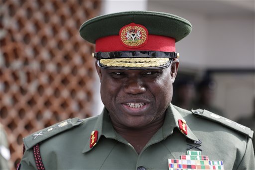 In this photo taken Thursday, Feb. 19, 2015, Nigerian army chief Lt. Gen. Kenneth Minimah, during a function in Lagos, Nigeria.  Nigeria's army chief said that residents displaced from Baga town in the country's northeast should be able to return to vote in March elections after the military reclaimed the town from Islamic extremists. (AP Photo/Sunday Alamba)