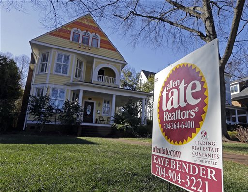 This Jan. 8, 2015 photo shows a home for sale in Charlotte, N.C. The National Association of Realtors reports on sales of existing homes in January on Monday, Feb. 23, 2015. (AP Photo/Chuck Burton)