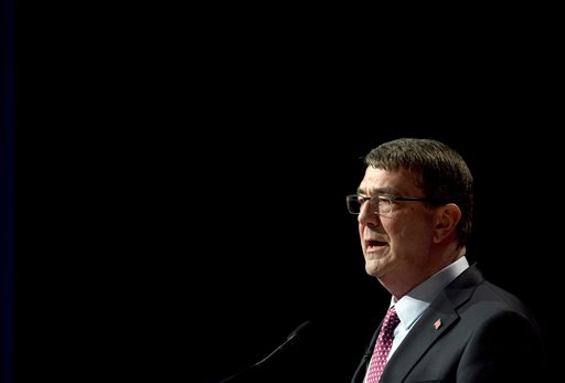 File-This March 6, 2015, file photo shows Defense Secretary Ash Carter, speaking during a ceremonial swearing-in ceremony at the Pentagon.  Carter is considering easing some military enlistment standards as part of a broader set of initiatives to better attract and keep quality service members and civilians across the Defense Department. While there are few details yet, Carter is exploring whether to adjust some of the requirements for certain military jobs, such as those involving cyber or high-tech expertise.  (AP Photo/Manuel Balce Ceneta)