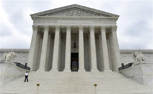 In this Oct. 3, 2014 file photo, the Supreme Court is seen in Washington. Americans confidence in all three branches of government is at or near record lows, according to a long-running and widely respected survey thats measured Americans attitudes on the subject over the last 40 years. The 2014 General Social Survey finds only 23 percent of Americans have a great deal of confidence in the Supreme Court, 11 percent in the executive branch and only 5 percent have a lot of confidence in Congress. By contrast, half have a great deal of confidence in the military. (AP Photo/Susan Walsh, File)