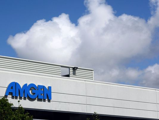 This April 20, 2010, file photo, shows an exterior view of Amgen offices in Fremont, Calif. Biotech drugmaker Amgen Inc. reports quarterly earnings on Tuesday, July 29, 2014. (AP Photo/Paul Sakuma)