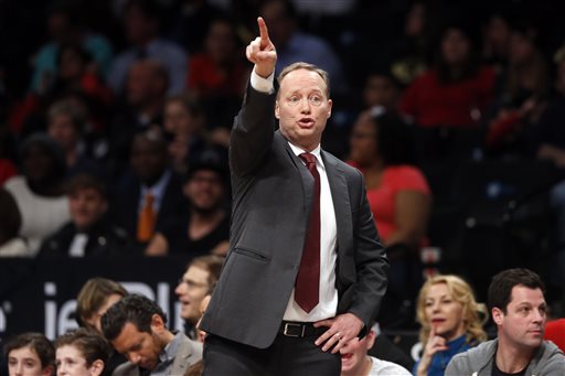 Atlanta Hawks coach Mike Budenholzer gestures to his team during the second quarter of an NBA basketball game against the Brooklyn Nets on Wednesday, April 8, 2015, in New York. Atlanta defeated Brooklyn 114-111. (AP Photo/Jason DeCrow)