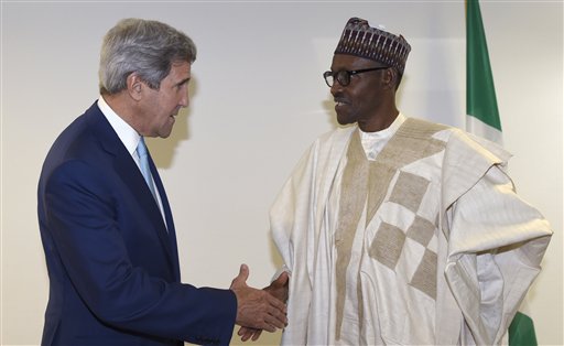 U.S. Secretary of State John Kerry, left, talks with newly inaugurated Nigerian President Muhammadu Buhari,  before the start of a formal meeting near Eagle Square in Abuja, Nigeria, Friday, May 29, 2015. (AP Photo/Susan Walsh, Pool)