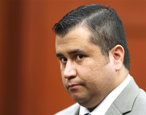 In this July 9, 2013, file photo, George Zimmerman leaves the courtroom for a lunch break his trial in Seminole Circuit Court, in Sanford, Fla. Police officers in Florida say Zimmerman has been involved in a shooting, Monday, May 11, 2015. Zimmerman was acquitted in 2013 of fatally shooting Trayvon Martin, an unarmed black teenager, in a case that sparked protests and national debate about race relations. (Joe Burbank/Orlando Sentinel via AP, Pool, File)