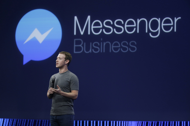 CEO Mark Zuckerberg talks about Messenger app during the Facebook F8 Developer Conference, Wednesday, March 25, 2015, in San Francisco. Facebook is trying to mold its Messenger app into a more versatile communications channel as smartphones create new ways for people to connect with friends and businesses beyond the walls of the company's ubiquitous social network. (AP Photo/Eric Risberg)