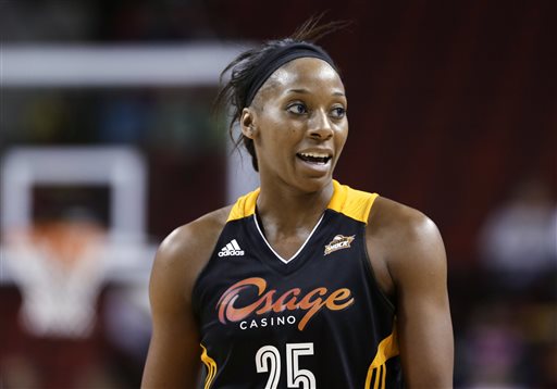 In this May 17, 2013, file photo, Tulsa Shock's Glory Johnson pauses during the team's preseason WNBA basketball game against the Seattle Storm in Seattle. Johnson had no idea her fight with Brittney Griner would become such a big deal. (AP Photo/Elaine Thompson, File)