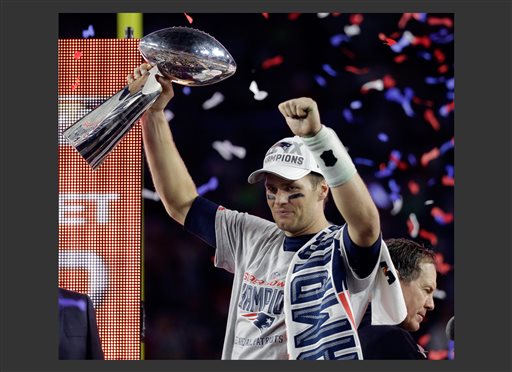 FILE - In a Feb. 1, 2015, file photo New England Patriots quarterback Tom Brady holds up the Vince Lombardi Trophy after the Patriots defeated the Seattle Seahawks 28-24 in NFL Super Bowl XLIX in Glendale, Ariz.   The NFL Monday, May 11, 2015, suspended Super Bowl MVP Brady for the first four games of the season. (AP Photo/Mark Humphrey)