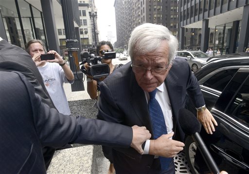 Former House Speaker Dennis Hastert arrives at the federal courthouse, Tuesday, June 9, 2015, in Chicago for his arraignment on federal charges that he broke federal banking laws and lied about the money when questioned by the FBI. The indictment two weeks ago alleged Hastert agreed to pay $3.5 million to someone from his days as a high school teacher not to reveal a secret about past misconduct. (AP Photo/Paul Beaty)