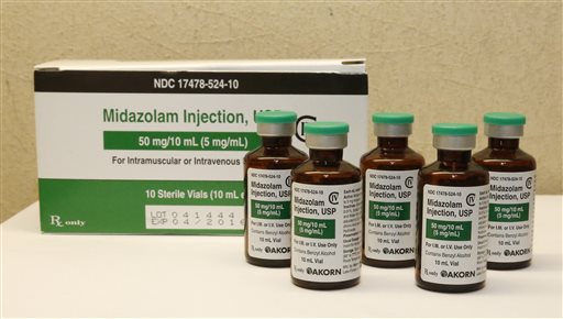This Friday, July 25, 2014 file photo shows bottles of midazolam at a hospital pharmacy in Oklahoma City. On Monday, June 29, 2015, The Supreme Court voted 5-4 in a case from Oklahoma saying that the sedative midazolam can be used in executions without violating the Eighth Amendment prohibition on cruel and unusual punishment. (AP Photo/Sue Ogrocki, File)